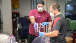 Technicians in the Fischer Engineering Design Center are assembling 3,000 face shields for Baylor College of Medicine in Houston. | Image: Justin Baetge/Texas A&M Engineering
